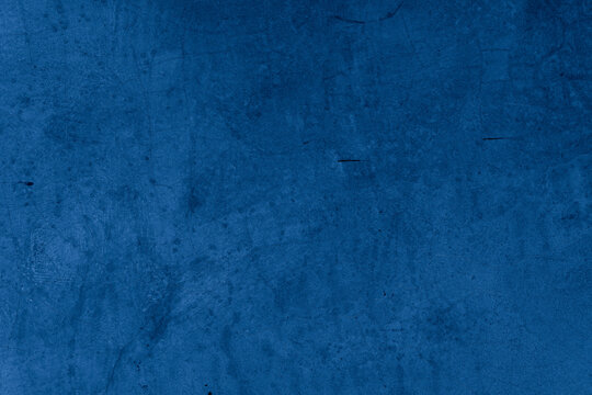 Old wall pattern texture cement blue dark abstract blue color design are light with black gradient background. © Kamjana