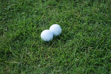 golf ball on green grass