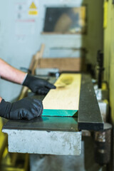 worker working in wood production factory