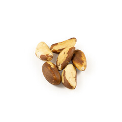 A handful of Brazil nuts on a white background