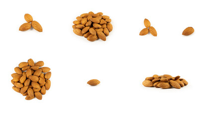 A handful of almonds on a white background