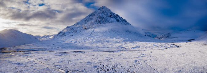 a view of buachaille etive mor and rannoch moor in winter in the argyll region of the highlands of scotland showing snow dusting on the mountains and munros © Andy Morehouse