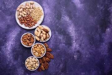 Obraz na płótnie Canvas Almonds, pecan, macadamia, pistachio, and cashew