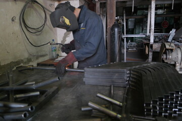 welder working in factory