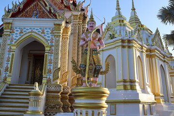 Fototapeta premium Guardian giant is standing in front of church Buddhist temple closeup.