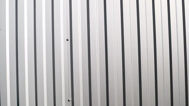 White Corrugated metal sheet surface of the wall. Galvanize steel background.