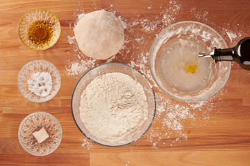 Making italian pizza step by step: adding olive oil