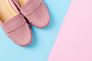 Stylish female shoes in pastel colors.