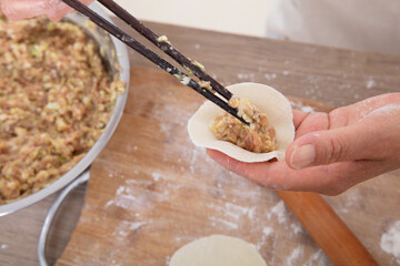 Chinese traditional festival food making dumplings