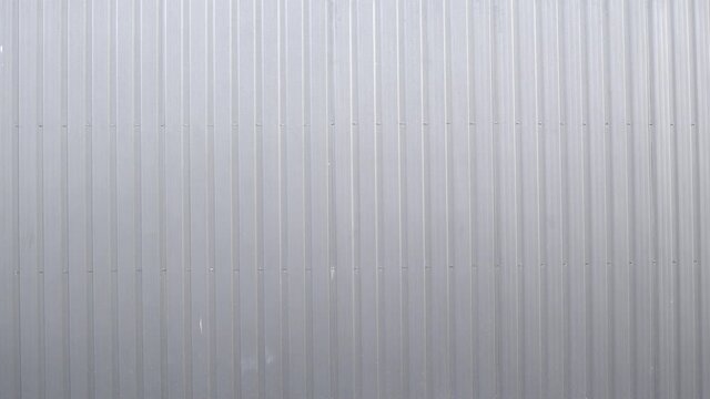 White Corrugated metal sheet surface of the wall. Galvanize steel background.