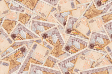 100 Guatemalan quetzales bills lies in big pile. Rich life conceptual background