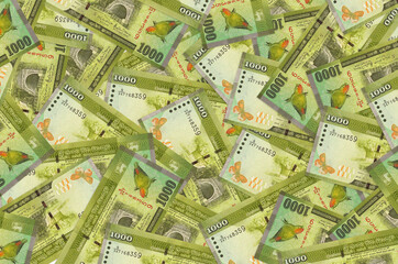 1000 Sri Lankan rupees bills lies in big pile. Rich life conceptual background