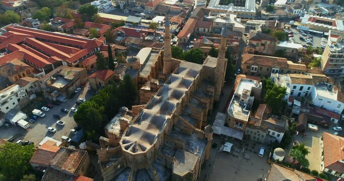 Aerial view of Selimiye Mosque [ St. Sophia Catedral ] and the city of Nicosia, North Cyprus. Lefkosa. 4K.