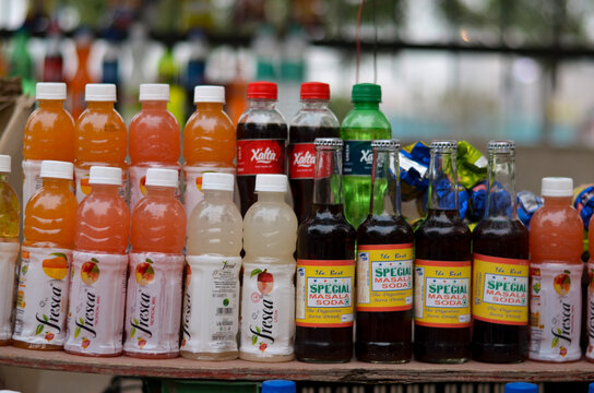 Delhi, India, 2020. Indian cold drink juices kept for display at a roadside vendor shop during summers. Local Soft drink brands compete with global companies like Pepsi and Coca Cola. Fresca, Xalta