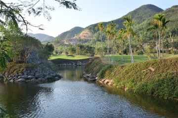 View of the canal against the background of the mountains