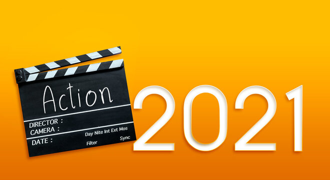 Action text title on film slate and new 2021.
