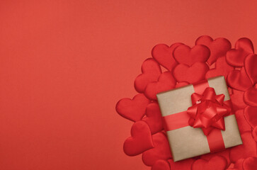Valentines day background. Gift box with decorative red hearts. Top view, flat lay, copy space