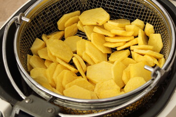 fresh crispy french fries from the deep fryer