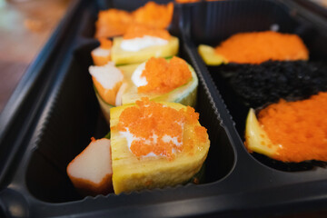 delicious sushi on ready-to-eat food container