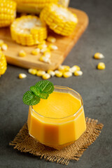 a glass of corn juice ready to eat © artit
