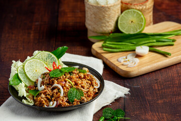 Thai food;spicy minced pork serve with side dishes