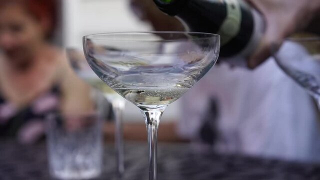 Pouring a Drink into a wine glass