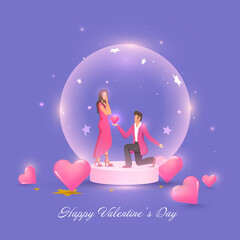 Young Man Proposing His Girlfriend Inside Glass Globe With Glossy Pink Hearts On The Occasion Of Happy Valentine's Day.