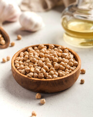 Raw chickpeas in a wooden bowl. Superfood. 