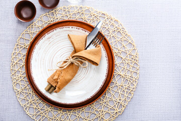 Beautiful table setting on light background