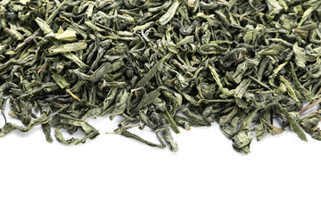 Dry green tea on white background