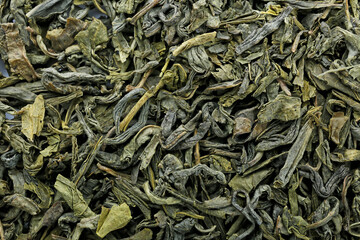 Dry green tea as background