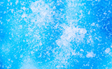 Blue paint on the snow in winter.