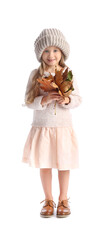 Cute little girl with autumn leaves on white background