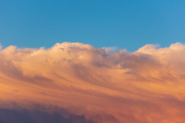 Obraz premium Colorful clouds at sunset as background.