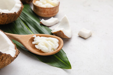Composition with coconut oil on light background