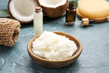 Composition with coconut oil and cosmetics on grey background