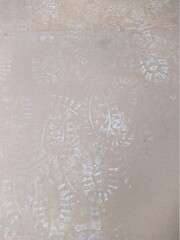 dusty footprints on cardboard during repairs closeup photo