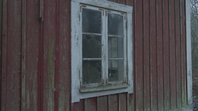 Close up of an abandoned houses window