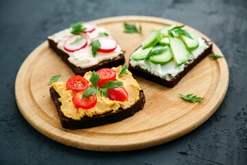 Close-up vegetarian rye bread open sandwiches