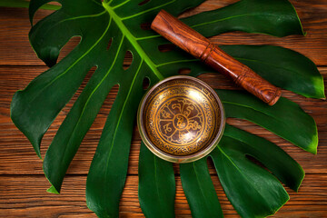 Tibetan singing bowl. Tibetian inscription - mantra "Om mani padme hum"(Om is a sacred syllable. Mani means "jewel", Padme is the "lotus flower", and Hum represents spirit of enlighment)