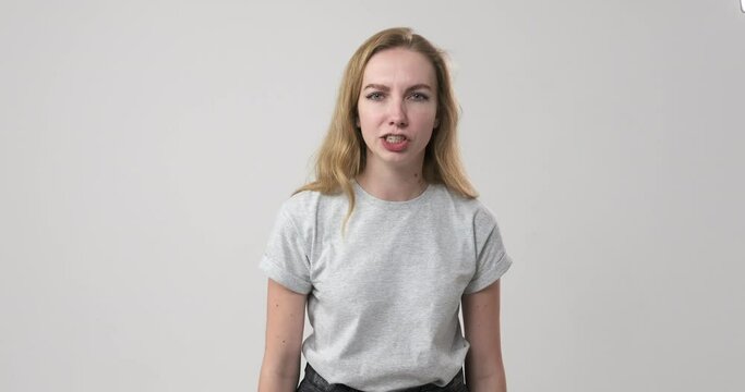 Angry woman arguing or having dispute over white background