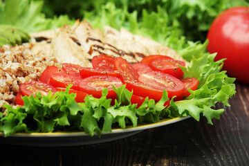 Turkey breast, avocado, salad and buckwheat as healthy lunch