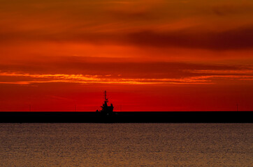 FIREABOAT - Sunrise on a rescue boat moored at the wharf