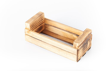 Handmade burned wooden box on a light background