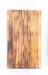 Handmade burned wooden box on a light background