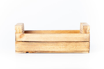 Handmade burned wooden box on a light background