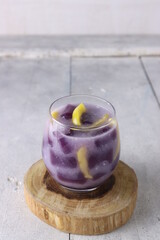 Biji Salak or Candil Ubi, Indonesian porridge with sweet potato glutinous rice balls and jack fruit, served with coconut milk. An Indonesian typical refreshment and dessert during Ramadan month.