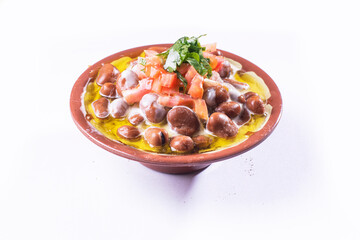 foul or ful Modammas Fava Beans Traditional Dish of Beans for all arab - White background 
