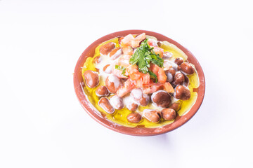 foul or ful Modammas Fava Beans Traditional Dish of Beans for all arab - White background 
