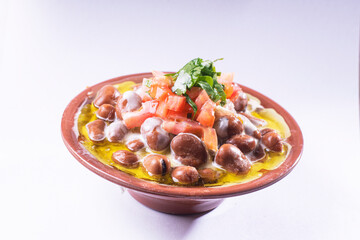 foul or ful Modammas Fava Beans Traditional Dish of Beans for all arab - White background 
